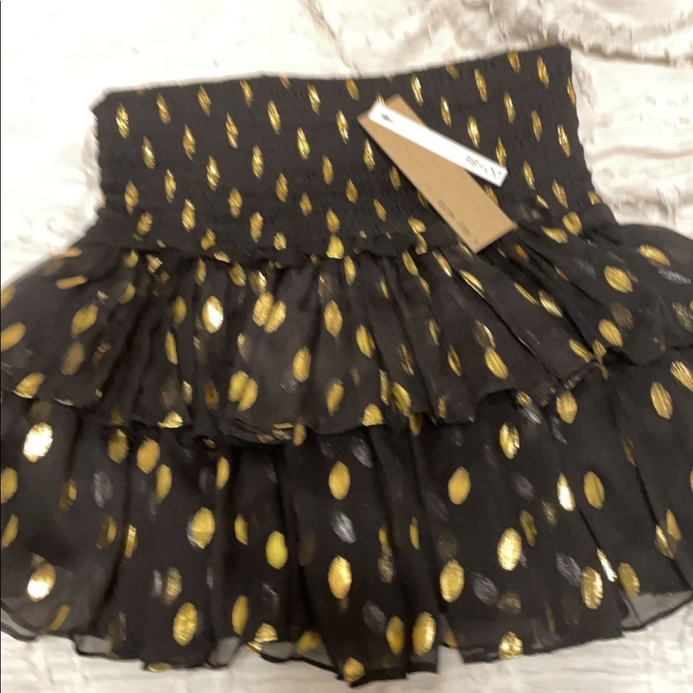 I just have to have it black and gold skirt! Super cute just big on me!